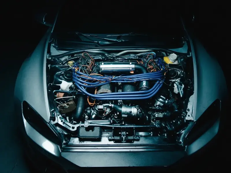 Engine bay seen from above with blue ignition leads